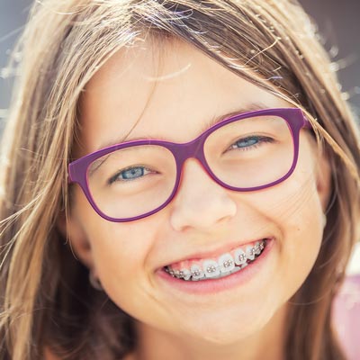 Tips for Dental Hygiene with Braces traditional metal braces Coastal Orthodontics Orthodontist in Beaufort, SC